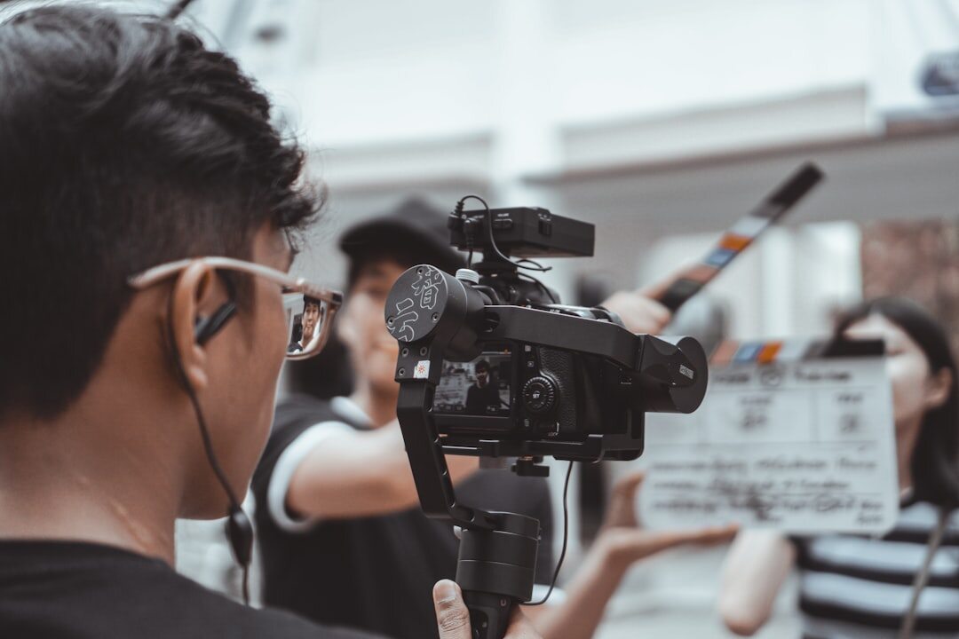 TV journalist conducting a formal interview with camera setup